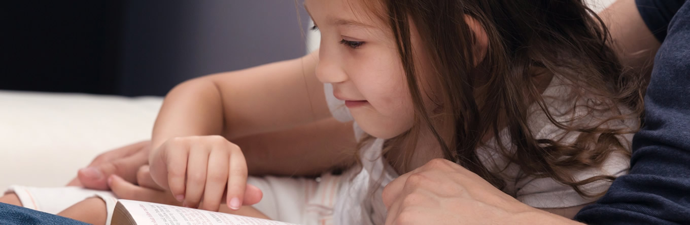 Child reading the bible